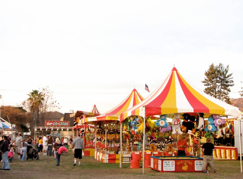 carnival tents with prizes at a school fundraiser